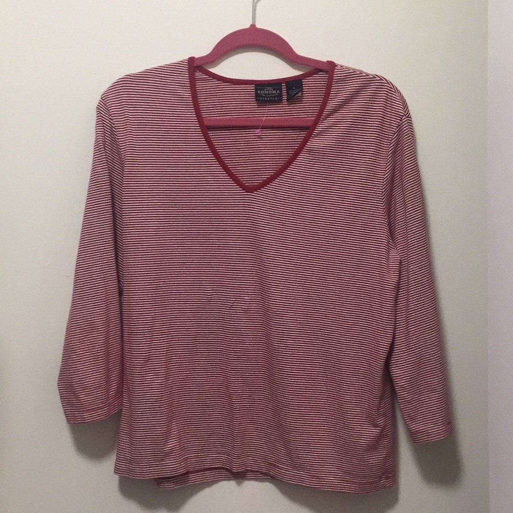 Red and white striped long sleeved shirt